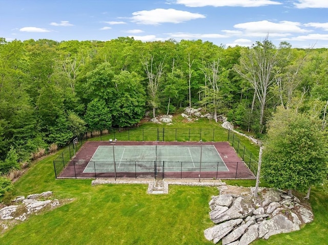 33 Moniz Dr, Westport, MA 02790 - view of tennis court featuring a wooded view