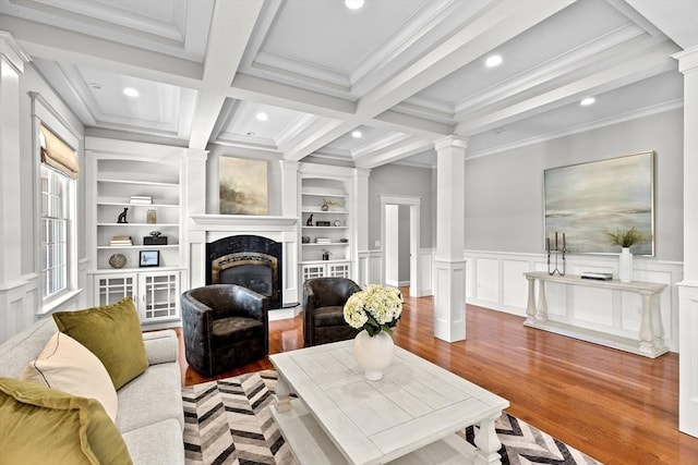 33 Moniz Dr, Westport, MA 02790 - living area featuring ornate columns, wood finished floors, a fireplace, ornamental molding, and recessed lighting