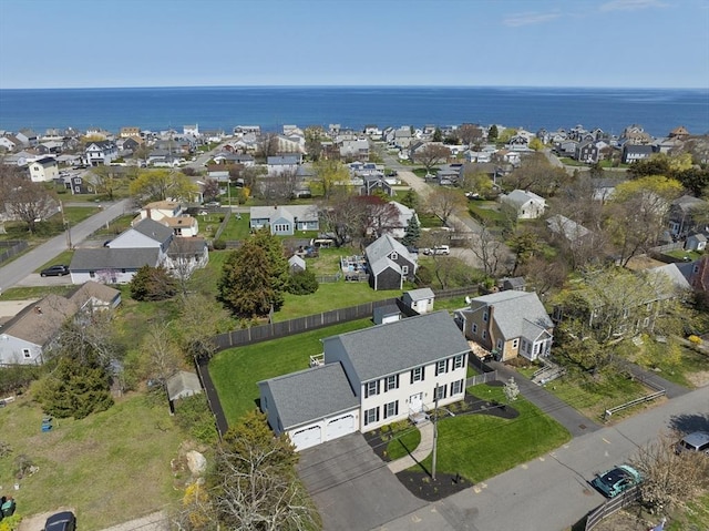 aerial view featuring a water view and a residential view