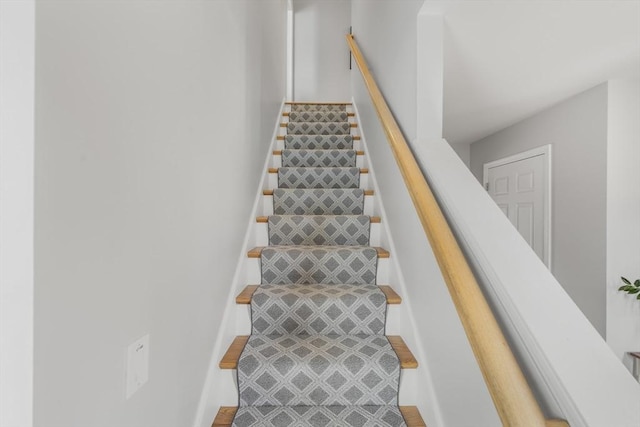 stairway with baseboards