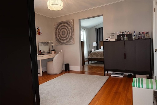 142 Vinal St, Revere, MA 02151 - bedroom featuring wood finished floors, ornamental molding, and vaulted ceiling