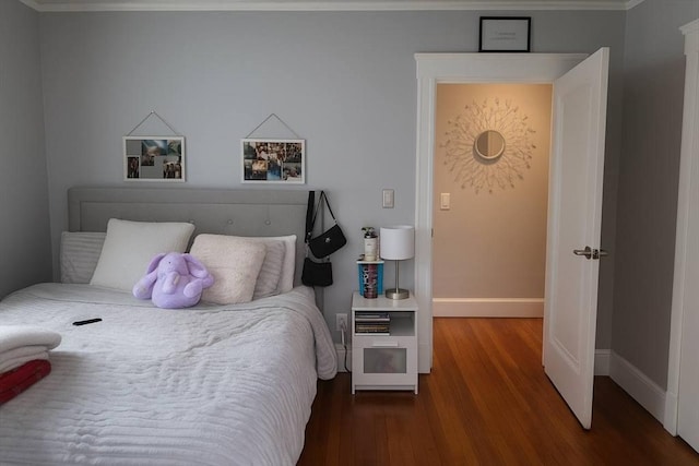 142 Vinal St, Revere, MA 02151 - bedroom with wood finished floors and crown molding