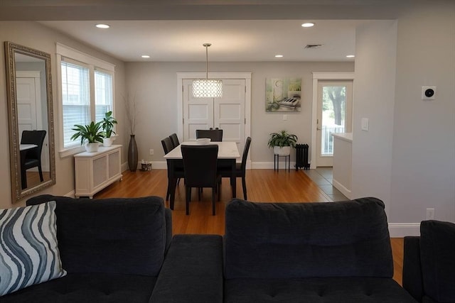 142 Vinal St, Revere, MA 02151 - dining space with light wood-style flooring, radiator, radiator heating unit, and recessed lighting