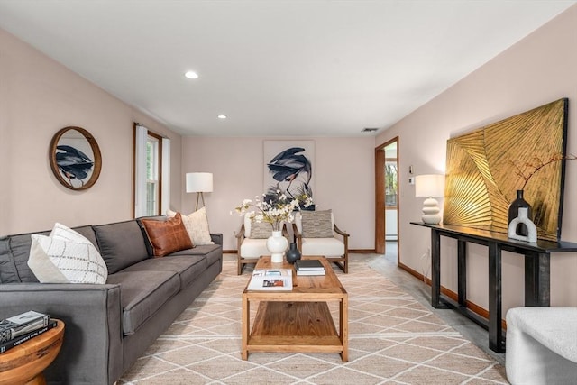 living room featuring visible vents, recessed lighting, and baseboards