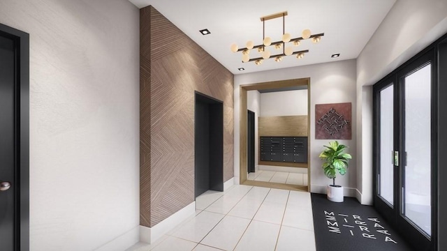 hallway with tile patterned flooring, mail area, an accent wall, and a notable chandelier