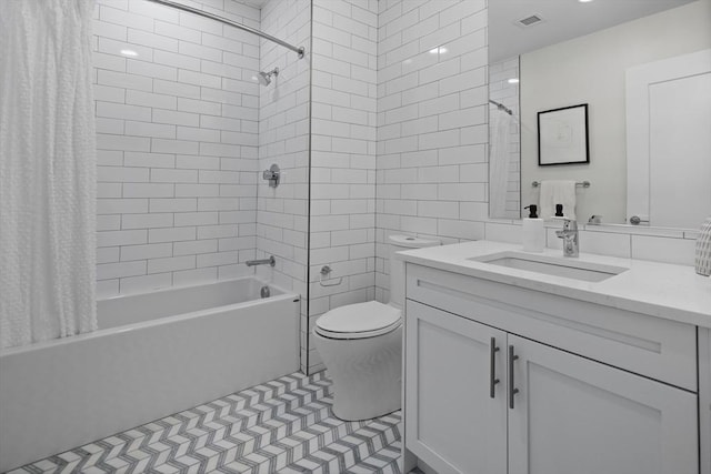 full bathroom with vanity, shower / bath combo with shower curtain, toilet, and visible vents