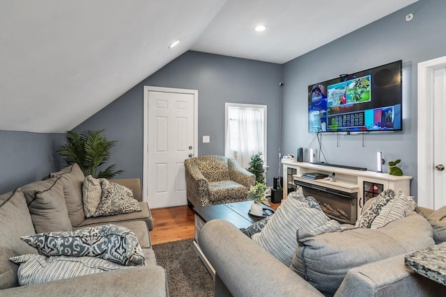 7 S Harlem St, Worcester, MA 01610 - living room featuring wood finished floors, vaulted ceiling, and recessed lighting