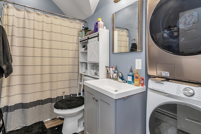 7 S Harlem St, Worcester, MA 01610 - bathroom featuring stacked washer / dryer, vanity, lofted ceiling, and a shower with curtain