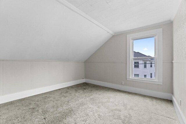 19 Park St, Webster, MA 01570 - bonus room featuring carpet flooring, lofted ceiling, and a decorative wall