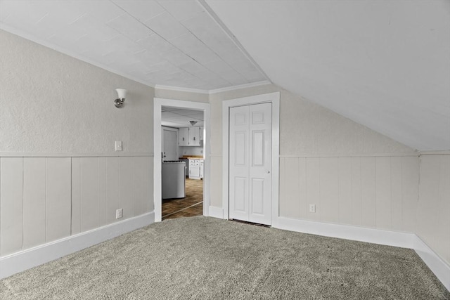 19 Park St, Webster, MA 01570 - bonus room featuring carpet floors, vaulted ceiling, and wainscoting