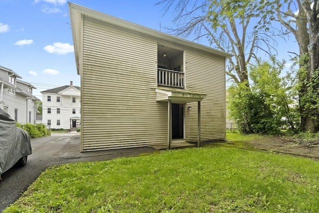 19 Park St, Webster, MA 01570 - rear view of house featuring a balcony and a yard