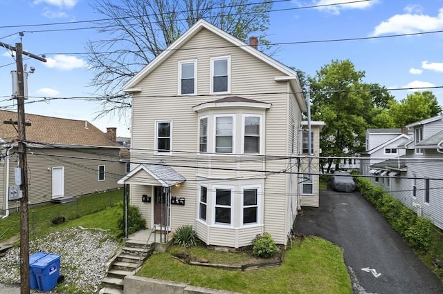 19 Park St, Webster, MA 01570 - view of front of property featuring fence and asphalt driveway