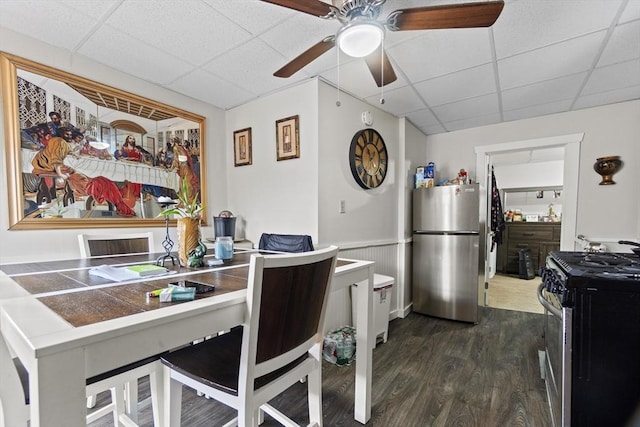 19 Park St, Webster, MA 01570 - dining space with a drop ceiling, dark wood-type flooring, ceiling fan, and a wainscoted wall