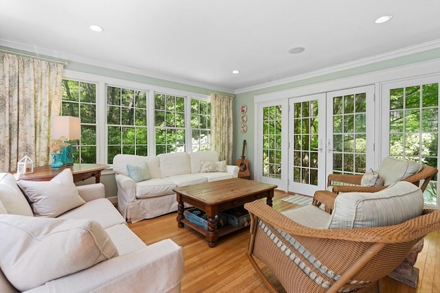 63 Claypit Hill Rd, Wayland, MA 01778 - sunroom with french doors, crown molding, wood finished floors, and recessed lighting