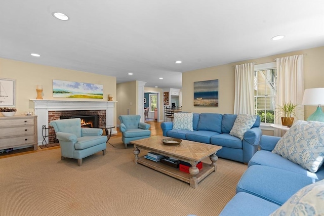63 Claypit Hill Rd, Wayland, MA 01778 - living area featuring recessed lighting and a brick fireplace