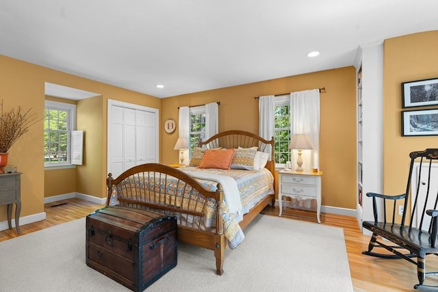 63 Claypit Hill Rd, Wayland, MA 01778 - bedroom featuring light wood-type flooring, baseboards, a closet, and recessed lighting