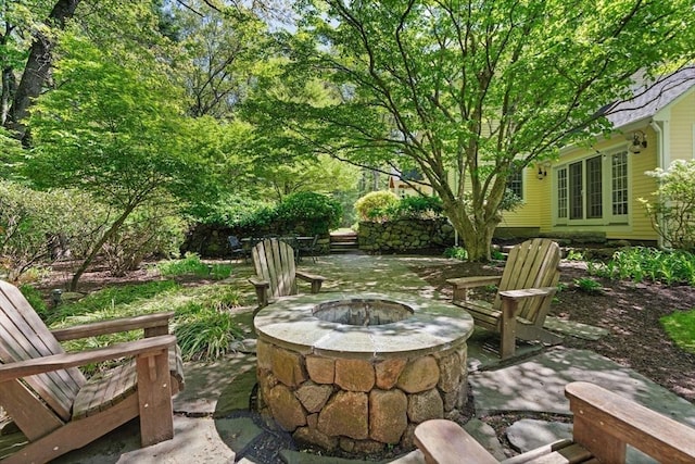63 Claypit Hill Rd, Wayland, MA 01778 - view of patio / terrace featuring an outdoor fire pit