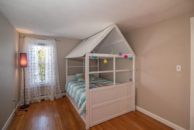 unfurnished bedroom with wood-type flooring