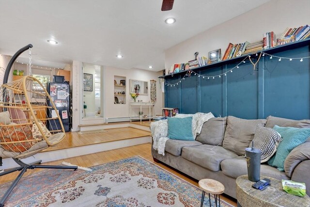 living area featuring recessed lighting and wood finished floors