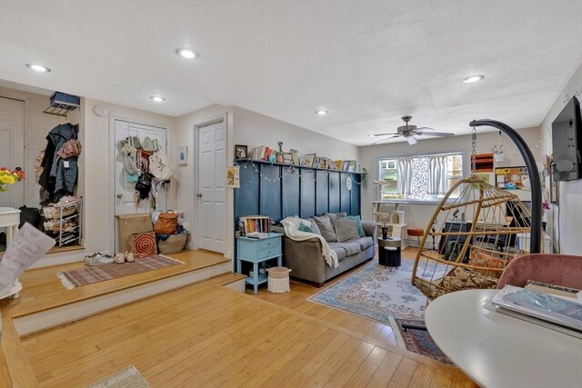 living area featuring recessed lighting, ceiling fan, and wood finished floors
