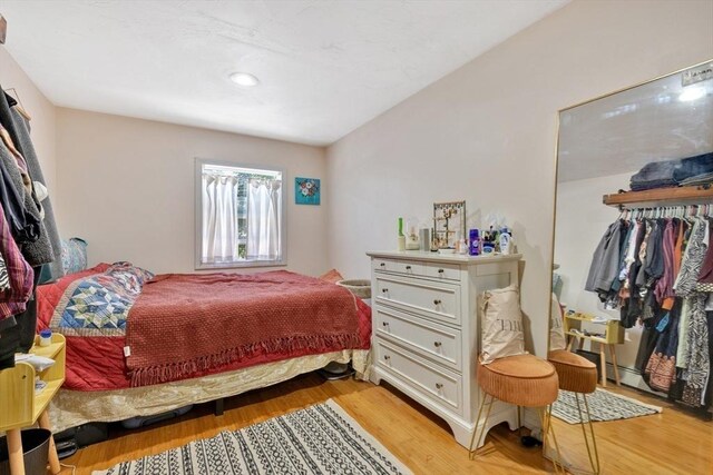 bedroom with light wood-style flooring