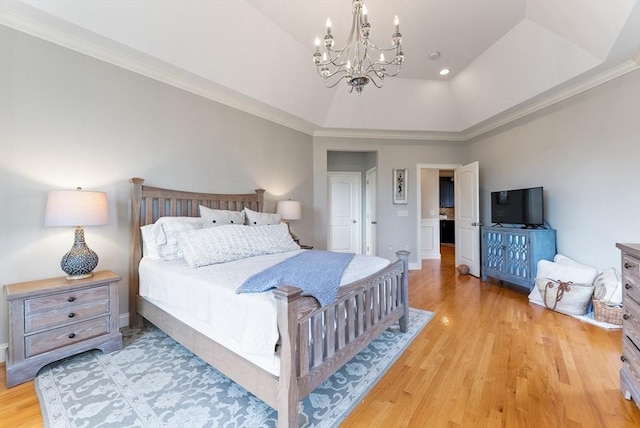 bedroom with crown molding, baseboards, an inviting chandelier, and light wood finished floors