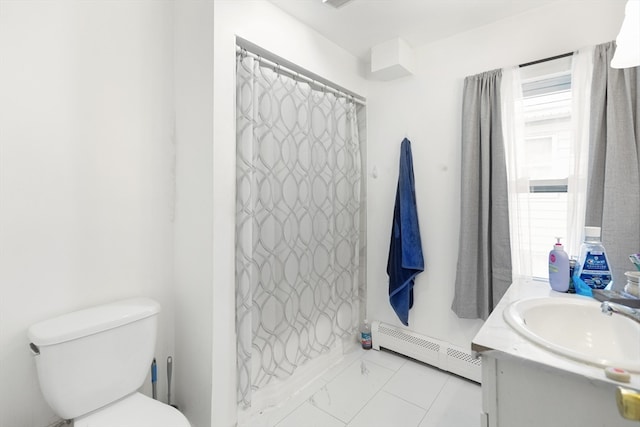 bathroom with a baseboard heating unit, vanity, toilet, and curtained shower