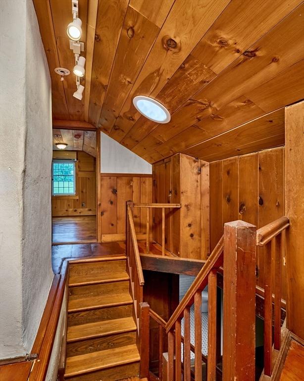 40 Whately Glen Rd, Conway, MA 01341 - stairs featuring lofted ceiling, wooden ceiling, wood finished floors, and wood walls
