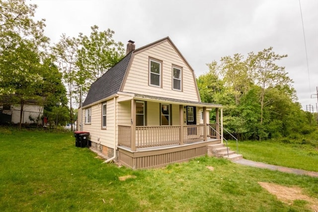 67 Thatcher St, Brockton, MA 02302 - view of front of property featuring a porch, a gambrel roof, a front lawn, and a chimney