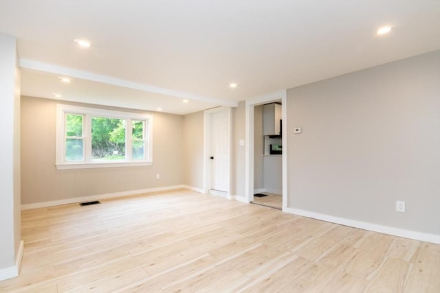 67 Thatcher St, Brockton, MA 02302 - empty room featuring light wood-style flooring, baseboards, and recessed lighting