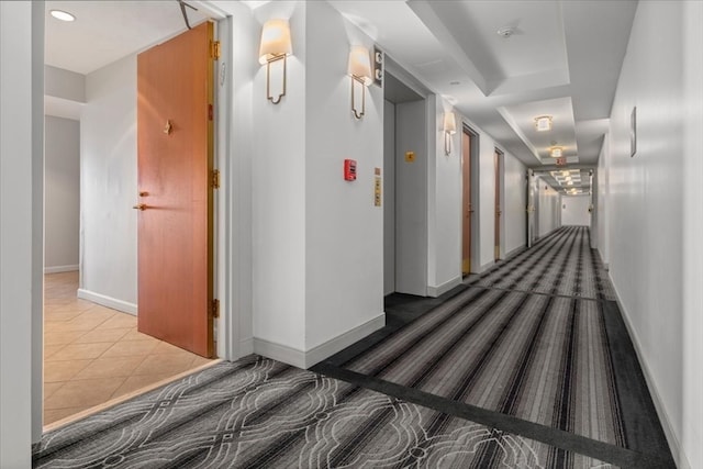 hall featuring tile patterned floors