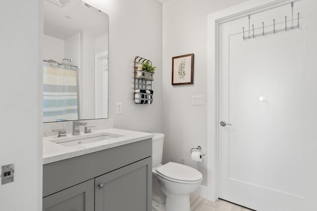 130 Broad Reach Unit 409, Weymouth, MA 02191 - full bath with toilet, vanity, and a shower with shower curtain