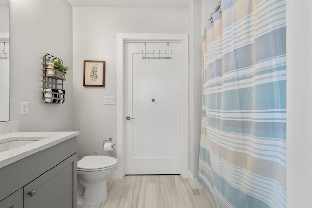 130 Broad Reach Unit 409, Weymouth, MA 02191 - bathroom with vanity and toilet
