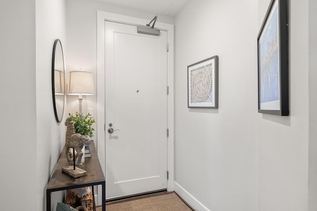 130 Broad Reach Unit 409, Weymouth, MA 02191 - doorway with baseboards