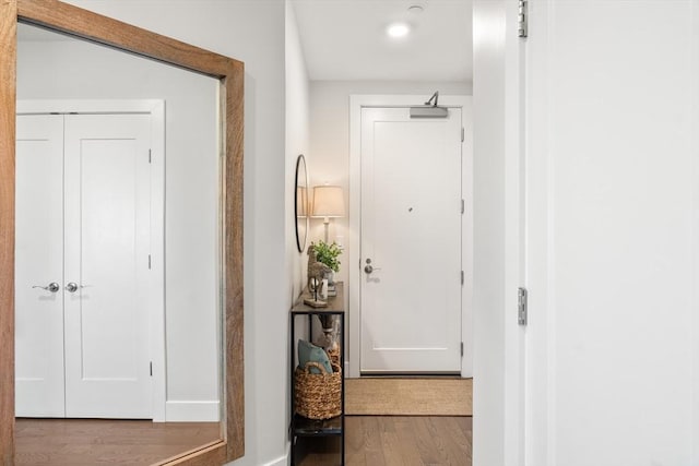130 Broad Reach Unit 409, Weymouth, MA 02191 - hallway featuring wood finished floors and baseboards