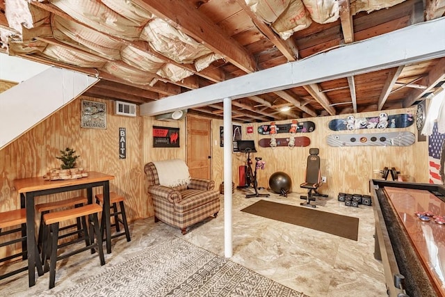 basement with wood walls