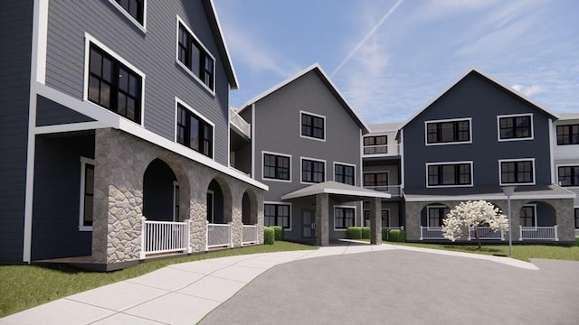 view of front of home with stone siding
