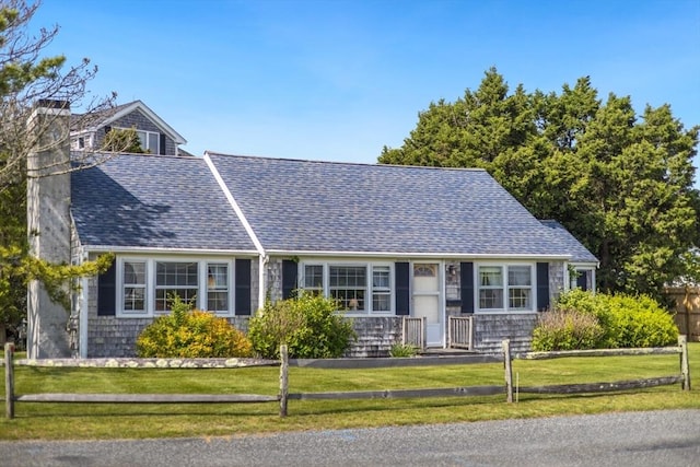 127 Short Beach Rd, Barnstable, MA 02632 - view of front of house with a chimney and roof with shingles