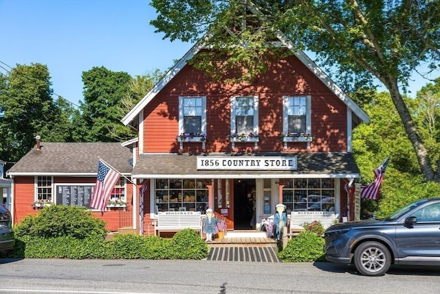 127 Short Beach Rd, Barnstable, MA 02632 - view of front of home with covered porch and roof with shingles