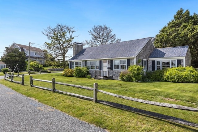 127 Short Beach Rd, Barnstable, MA 02632 - view of front of house with a chimney and roof with shingles