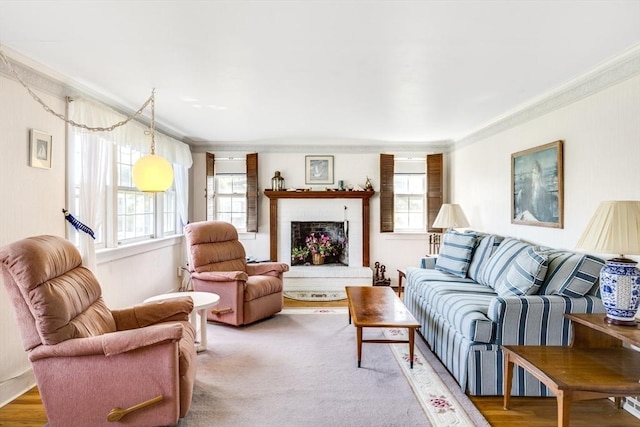 127 Short Beach Rd, Barnstable, MA 02632 - living area featuring crown molding and a fireplace