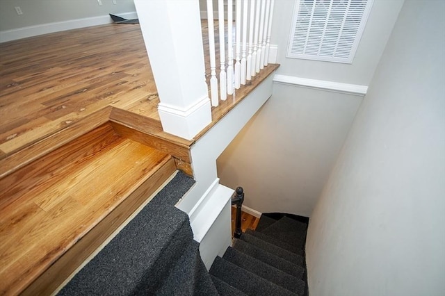 89 Morris St, Boston, MA 02128 - stairs featuring baseboards and wood finished floors