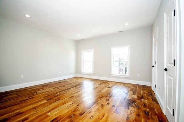 89 Morris St, Boston, MA 02128 - unfurnished room with wood finished floors and recessed lighting