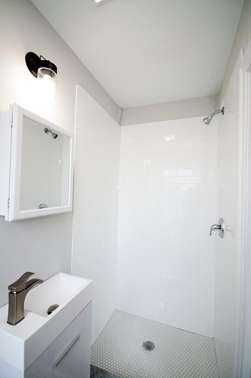 89 Morris St, Boston, MA 02128 - bathroom with a tile shower and vanity