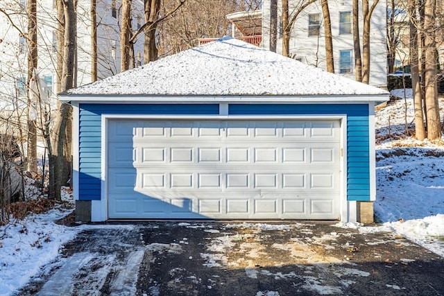 view of snow covered garage