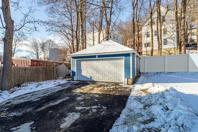 view of snow covered garage