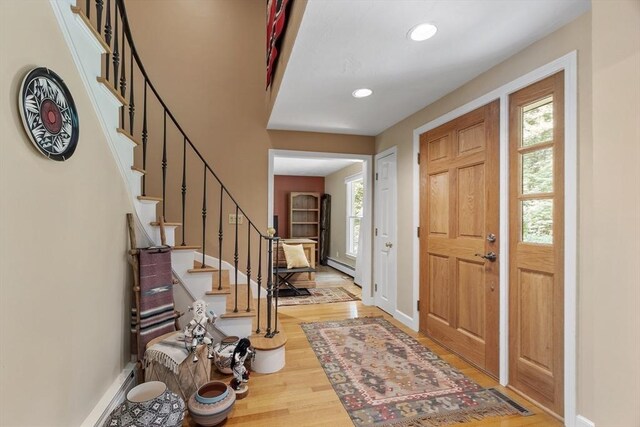 carpeted bedroom featuring multiple windows