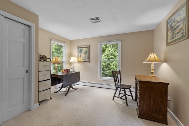 carpeted home office with a baseboard heating unit