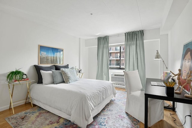 135 Pleasant St Unit 403, Brookline, MA 02446 - bedroom featuring wood finished floors
