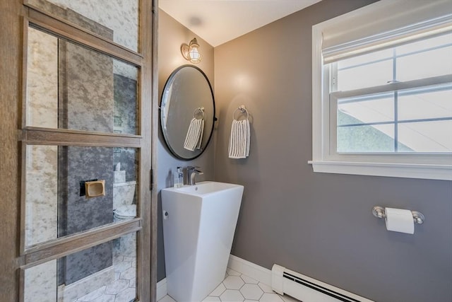 37 Hillcrest Ave, Methuen, MA 01844 - bathroom with baseboards, a baseboard radiator, tile patterned floors, and a sink